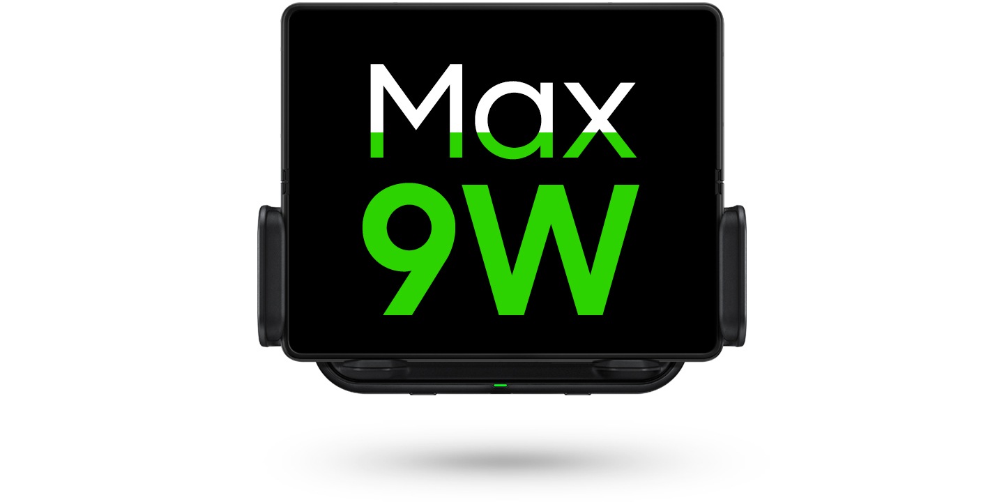 The words Max 9W in green is on the screen and the device is mounted to the wireless car charger. On the bottom of the charger, a green light indicates the charging status.