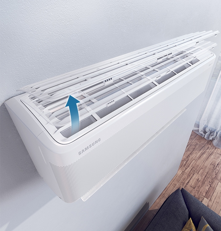 Shows that the Easy Filter Plus can be easily removed by lifting up the cover of the air conditioner, so that it can be cleaned.