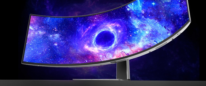 The monitor shows a black hole in space on the screen.