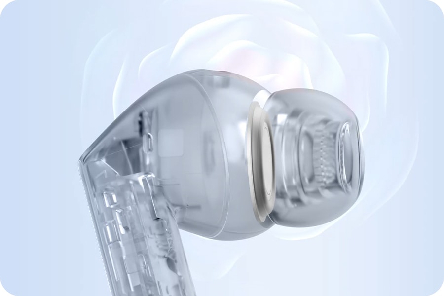Side view of a transparent Galaxy Buds3 FE, revealing the speaker inside the earbud. Galaxy Buds3 FE makes a slight turn with the internal speaker vibrating to represent emitted sound, and transitions from transparent to black.