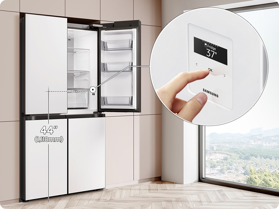Inside the right bottom corner of the refrigerator is an internal display panel. It's set at 37F. A finger presses OK. 