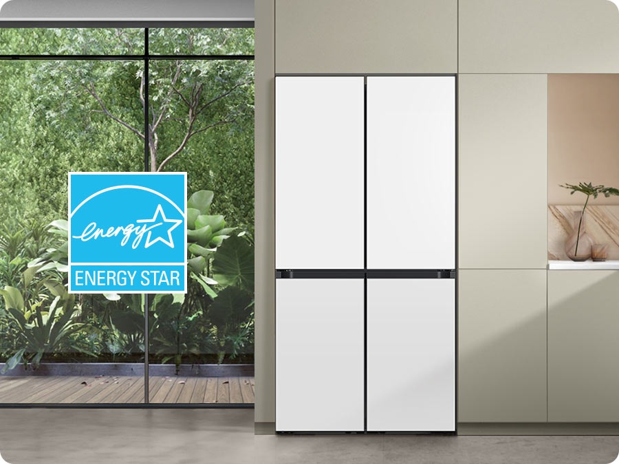 There is a Bespoke refrigerator in a sunlit kitchen. Next to its left is the ENERGY STAR certified seal.