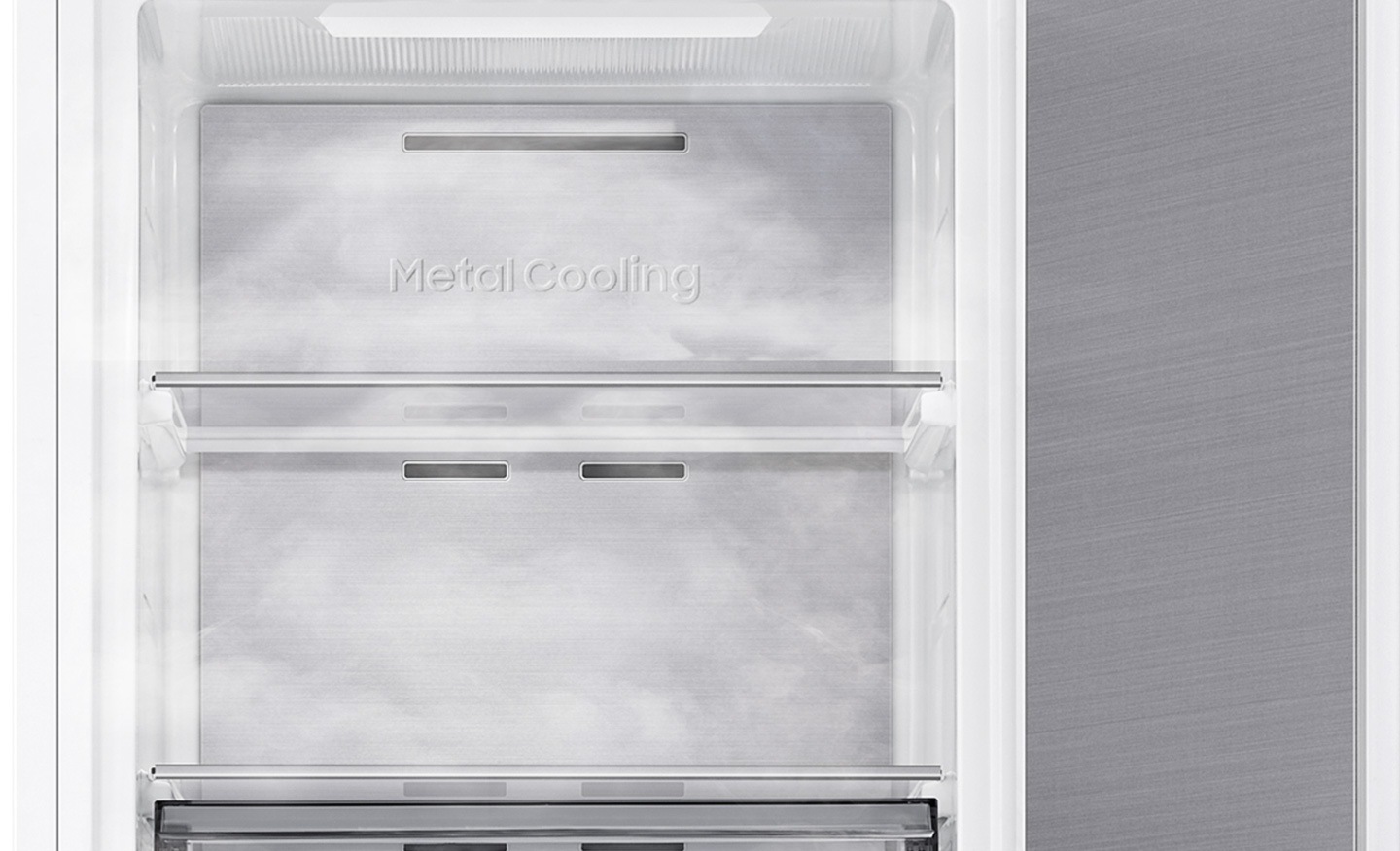 The Metal Cooling plates inside the refrigerator look extremely cold and the cold air flows around.