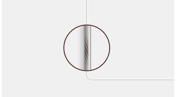 Closeup of One Invisible Connection cable shows its transparent material which greatly reduces its visibility.