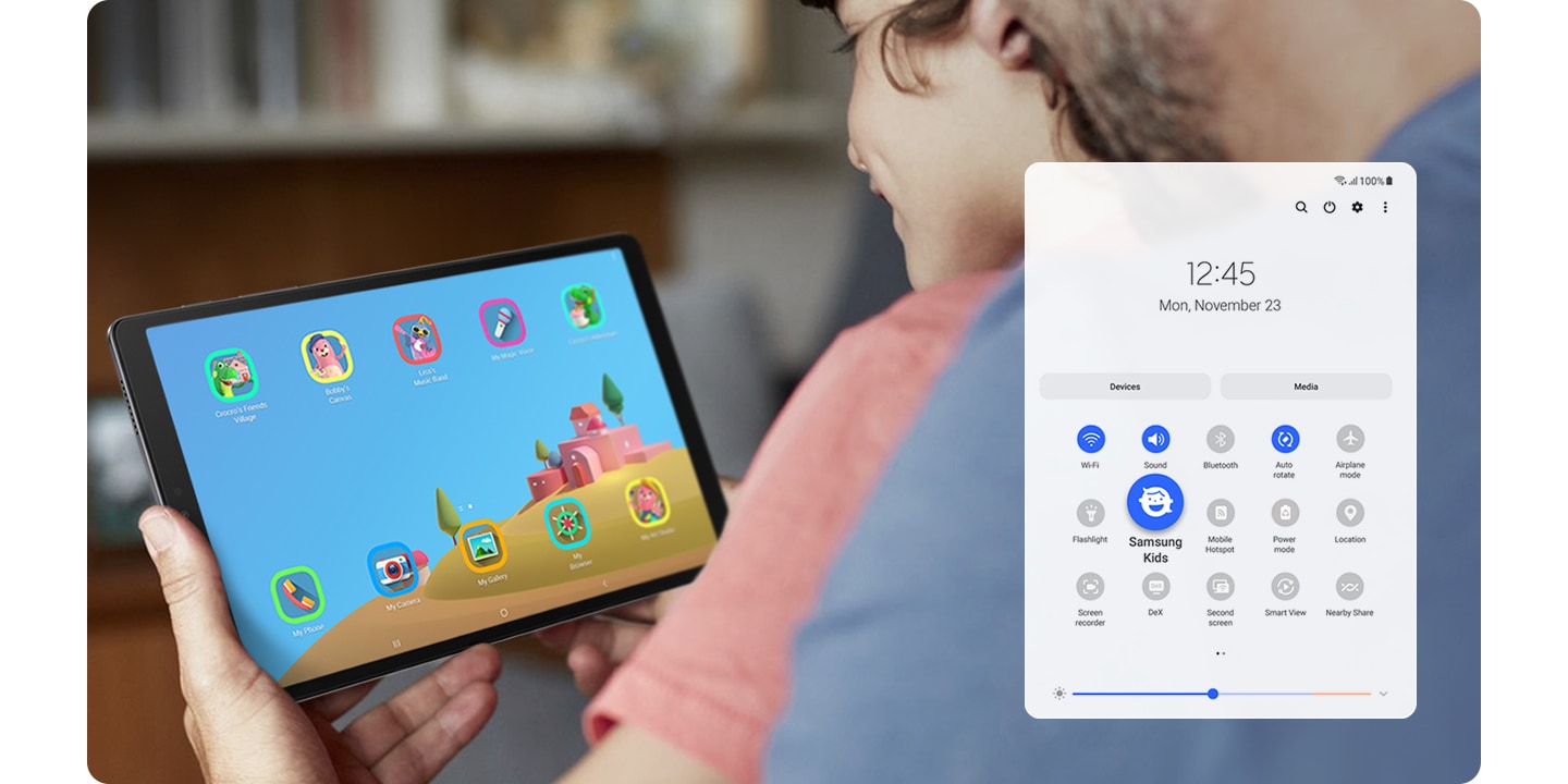 A young kid sits with parents, grinning at his Galaxy Tab A7 Lite. The parental usage control feature appears at the bottom.
