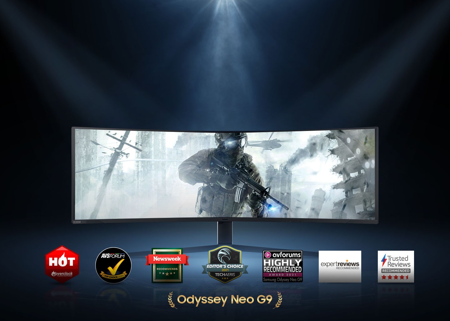 Lights which comes from top to bottom illuminates a place where Odyssey Neo G9 is placed.Above the monitor. †Odyssey Neo G9' is written in gold with laurel on each side.On the onscreen, a soldier is fighting with a gun in his hand on the battlefield. Award logos from Overclock, AVS forum, Newsweek, Techaeris, AV forums, Trusted Reviews are lining up near the stand.