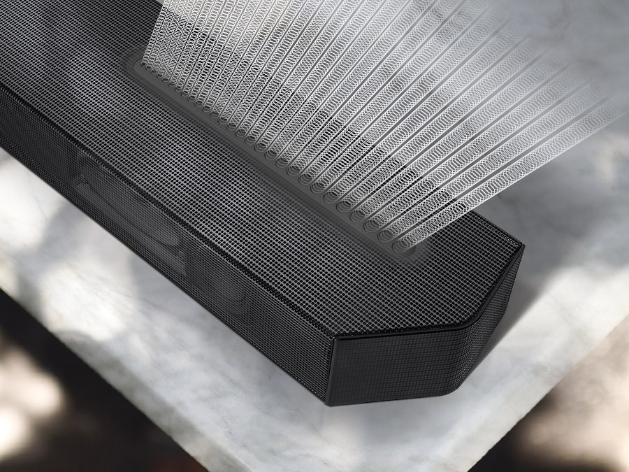 Precisely spaced soundwave graphics are coming out from the top of Q600B Soundbar, illustrating Samsung Acoustic Beam technology.