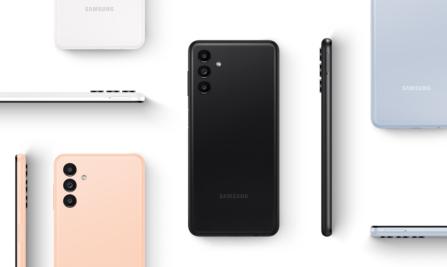 Various Galaxy A13 5G devices are placed in different positions to show the device from the back and the side. The devices are in black, white, light blue and orange copper colorways.
