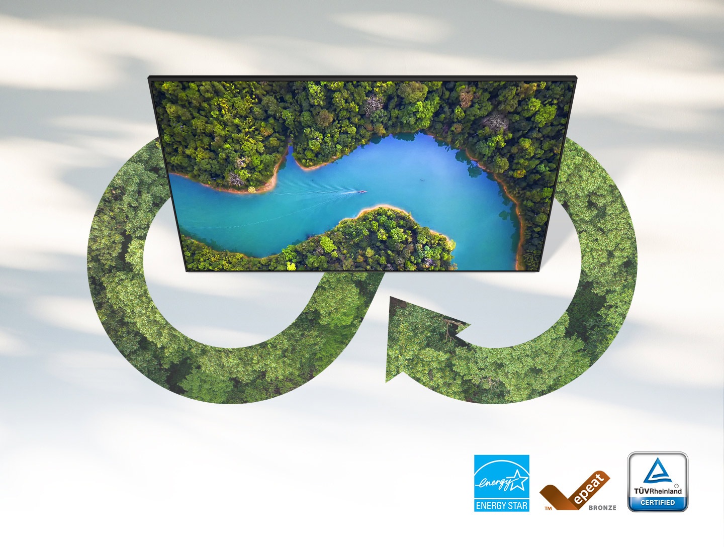 A signage product shows a natural environment with an aerial view of a river running through a forest. Around the signage, the forest is seen within an arrow that loops around the display, representing a sustainable product cycle. At the bottom, there are badges for Energy Star, EPEAT Bronze, and TÜV Rheinland.