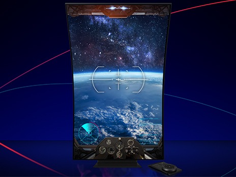 The Odyssey Ark is shown in vertical cockpit mode, with a remote lying next to it. On the vertical screen, there is a first-person view from a spaceship's cockpit, with controls at the bottom and a radar in the bottom left. Outside of the spaceship in the first person view, there is a planet surrounded by stars and nebulas.