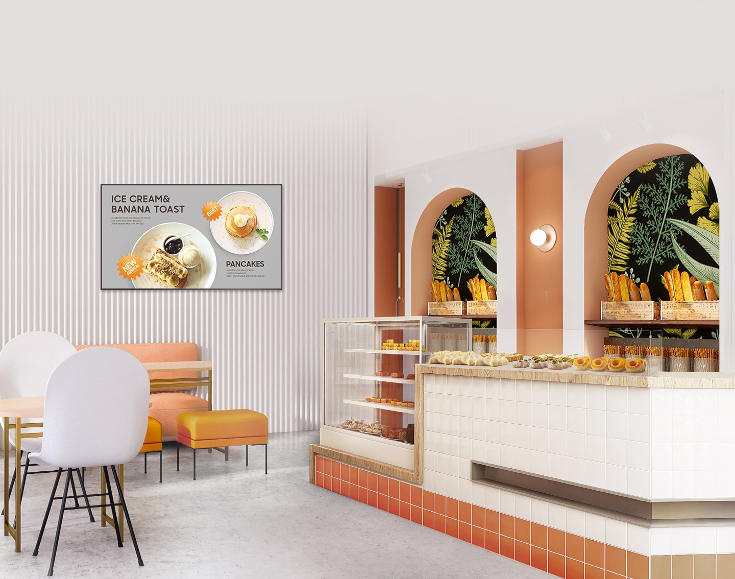 QM32C is installed on the wall of the bakery store, next to a counter with breads on a shelf.