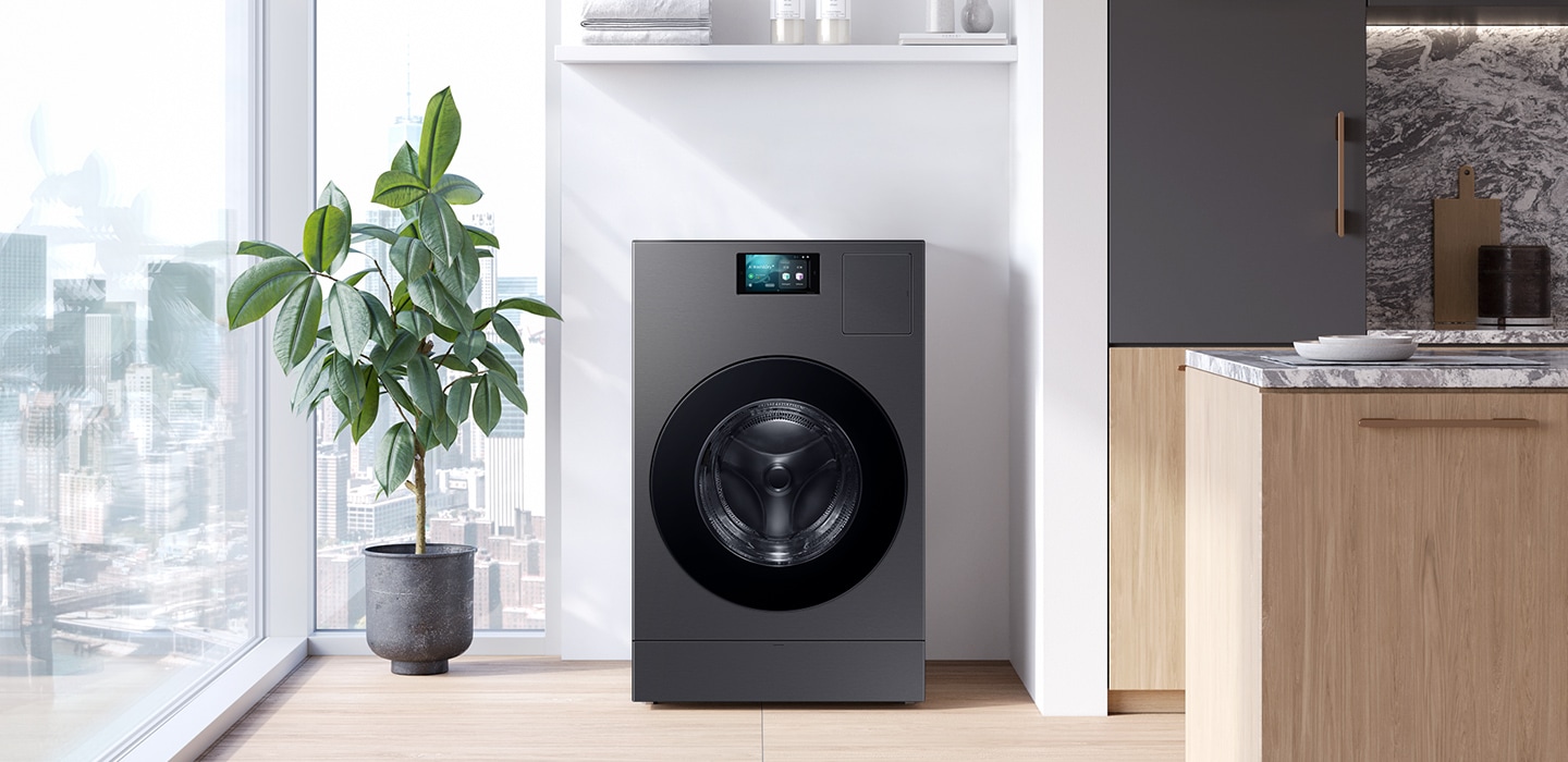 A washer-dryer All-in-one Combo is installed in a bright, sunlit apartment space next to a window.