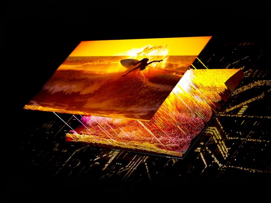 A surfer on the screen is displayed in detail through the Quantum Mini LEDs in the back that are accurately controlling light.