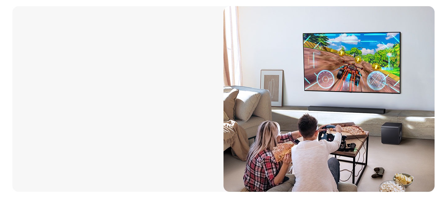 Two people enjoy an immersive 3D-like gaming experience with Game Pro mode on their Samsung soundbar.