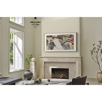 The Frame is mounted to a wall in a living room.