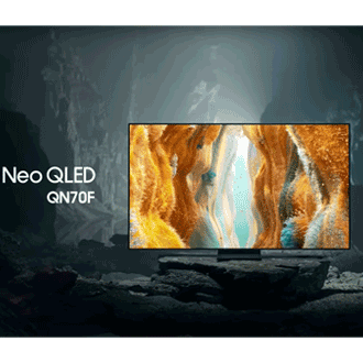 Samsung Neo QLED QN70F TV in a black and white underground space displays a colorful scene of an otherworldly landscape.