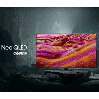 Samsung Neo QLED QN90F TV in a black and white underground space displays a colorful scene of an otherworldly landscape.