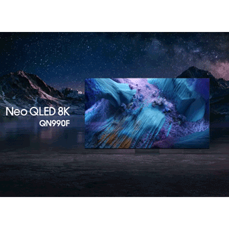 Samsung Neo QLED 8K QN990F TV against a mountain landscape at night displays a colorful scene of an otherworldly landscape.