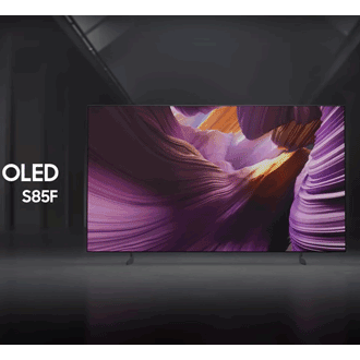 Samsung OLED S85F TV in a black and white indoor space displays a colorful scene of an otherworldly landscape.