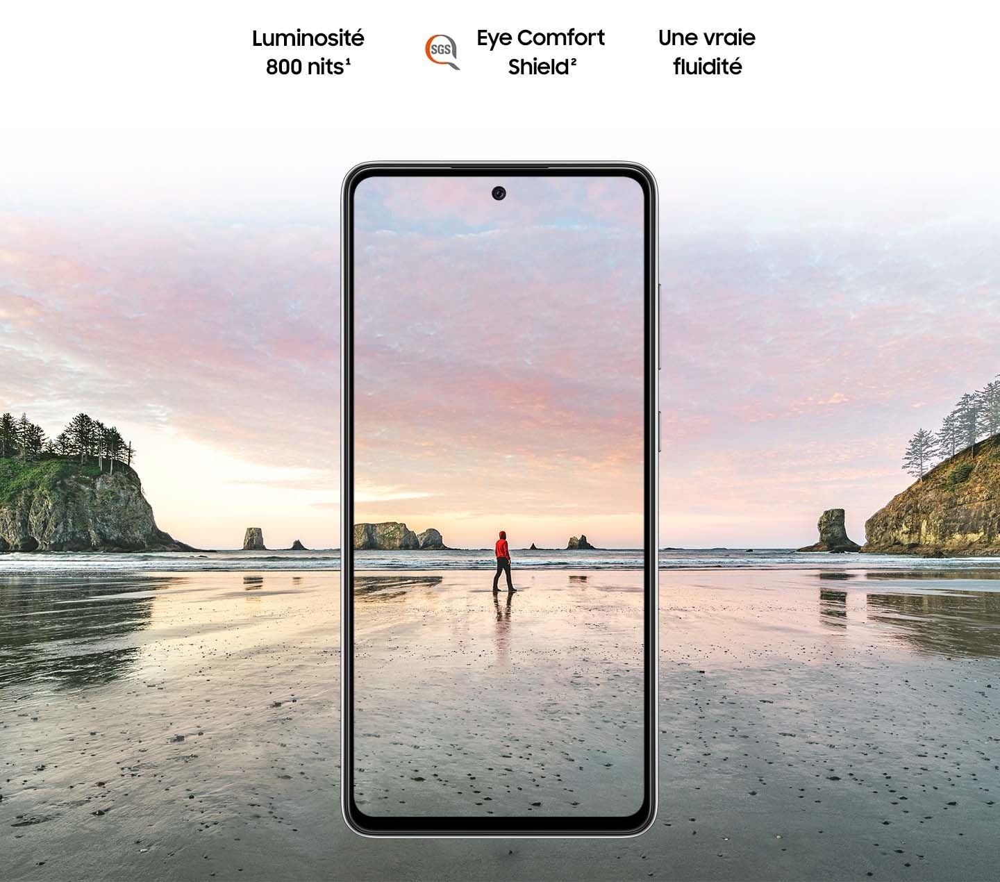 Galaxy A72 seen from the front. A scene of a man standing on a beach at sunset. Brightness 800 nits, Eye Comfort Shield with the SGS logo and Real Smooth.