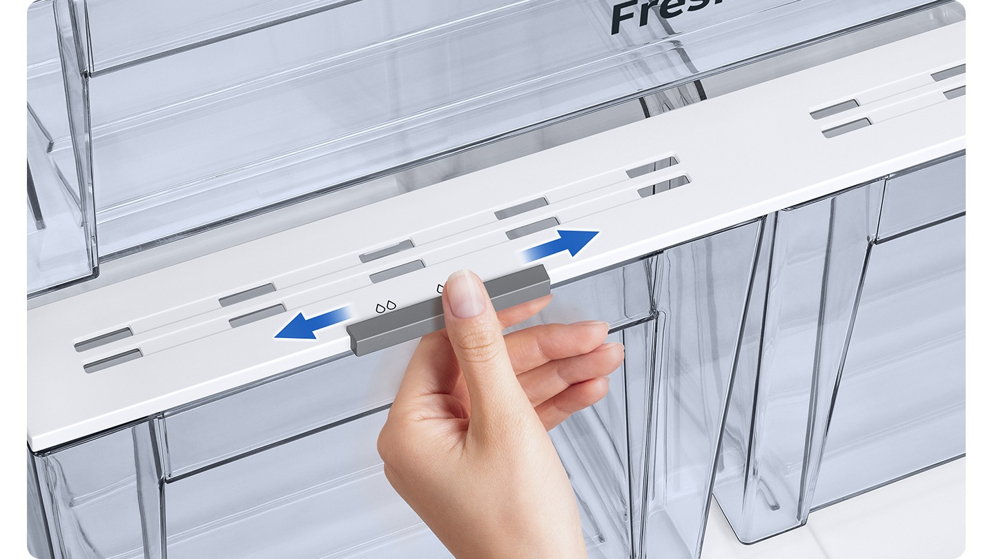 A person simple controls the humidity level of the crisper with a right and left swipe of a Humidity Control Flap located at the center top of the crisper.