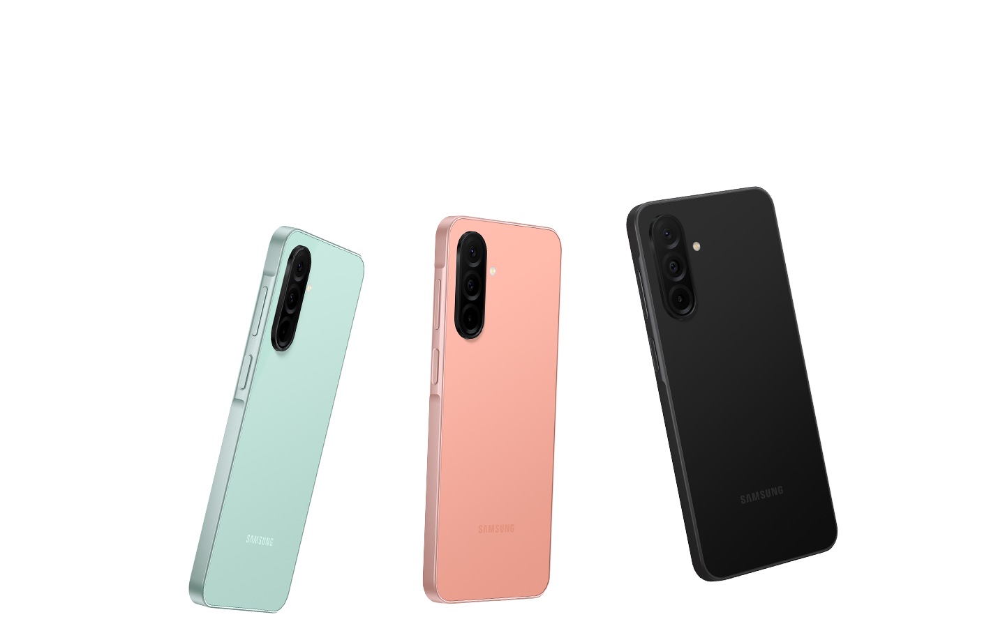 Three Samsung Galaxy A26 smartphones displayed in a row. Each phone showcases a sleek and modern design with a slim profile. The colours of the smartphones from left to right are mint, peach pink, and black.