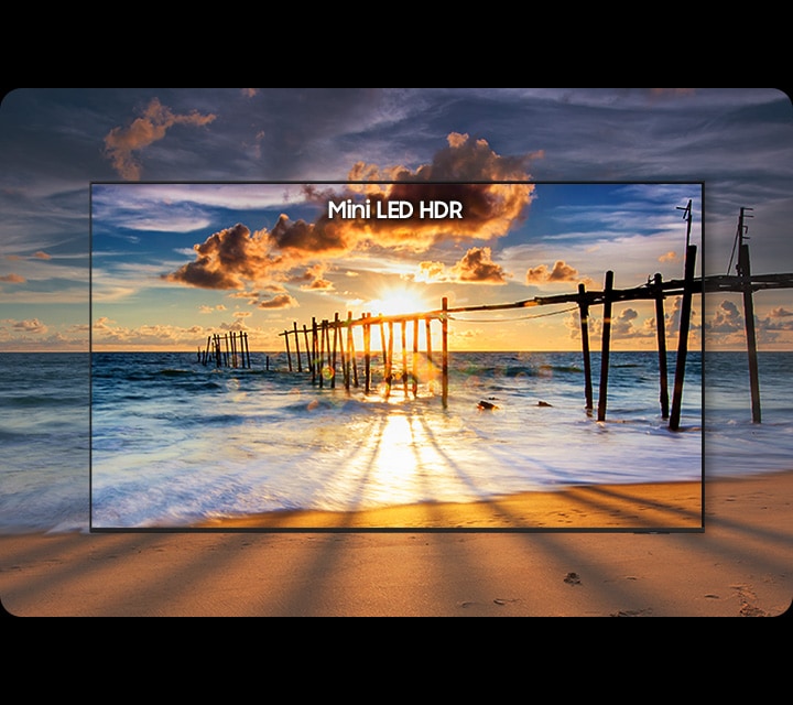 A vivid sunset over the ocean with bright highlights and deep shadows, showcasing Samsung Mini LED HDR’s enhanced contrast, brightness and fine detail across the scene.