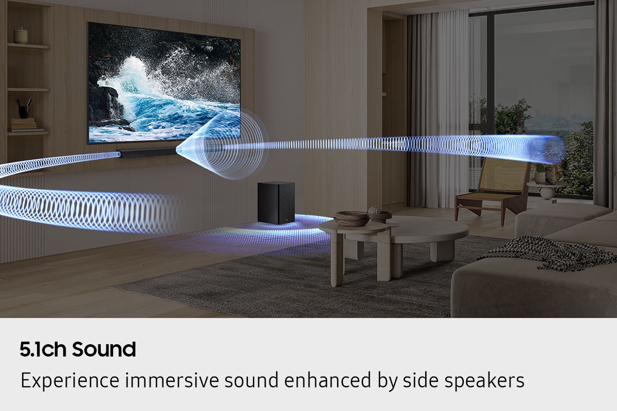 Living room setting with TV and B750F setup. Sound waves from the soundbar and subwoofer travel around and fill the room.