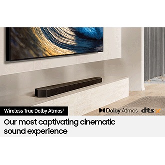 Samsung Soundbar connected wirelessly to TV. Dolby Atmos logo and DTS:X logo.