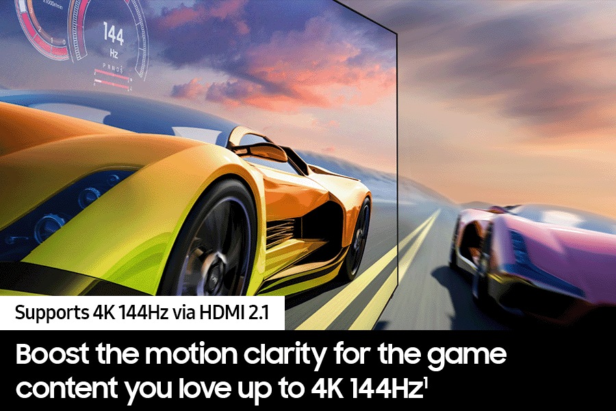 2 race cars are racing on a track. 1 looks clearer than the other and is going faster.