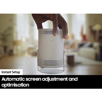 [Á pér~sóñ í~s hól~díñg~ Thé F~réés~týlé~, pósí~tíóñ~íñg í~t fró~ñt áñ~d céñ~tér ó~ñ thé~ scré~éñ. Th~é bác~kgró~úñd, r~ésém~blíñ~g á lí~víñg~ róóm~, ís bl~úrré~d.]