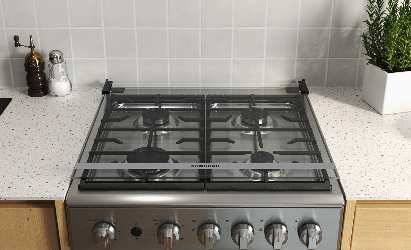 Shows the Tempered Cover Glass when it is down, covering the cooktop to protect it.