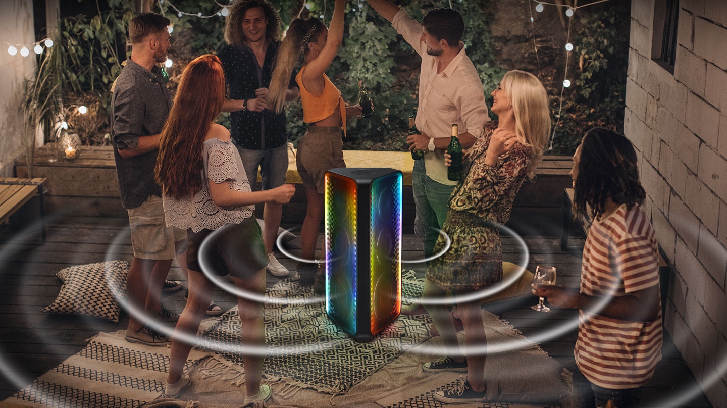 7 people are at an outdoor area having a party with a Sound Tower in the middle, which is sending out sound bi-directionally.