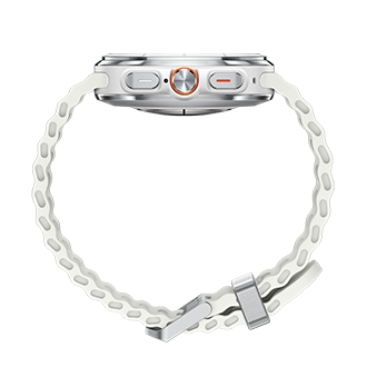 This image features the Samsung Galaxy Watch Ultra 2025, model L705faw, viewed from the side. The modern smartwatch has a sleek silver case, three buttons, one in vibrant orange, and a textured white band secured with a silver clasp.