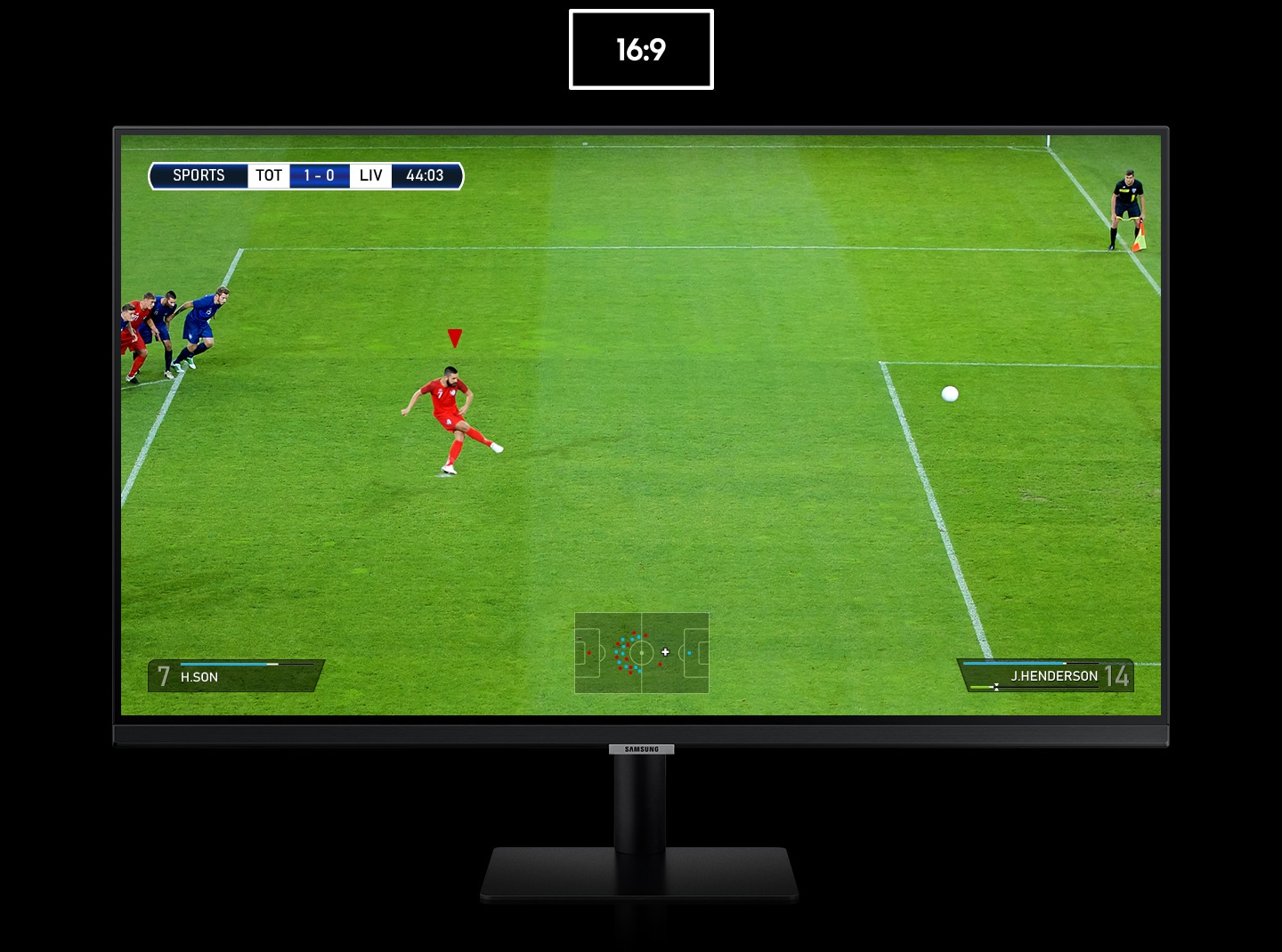 The monitor shows a photo of a penalty kick in a soccer match. As the 16:9 ratio display transforms to 21:9, the goalkeeper on the right and other players behind the kicker on the left are revealed. The additional view on each side highlighted by dotted lines.