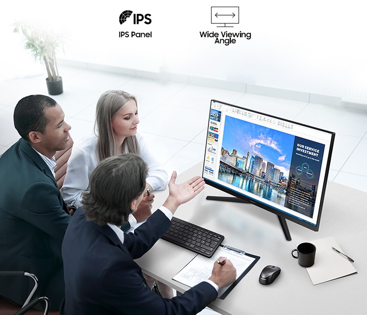 There are IPS Panel and Wide Viewing Angle icons. Three people are sitting around the monitor with the monitor in the middle, looking at the monitor and having a conversation.