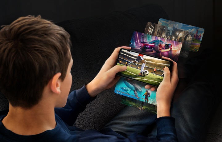 A person is playing games on the Galaxy A06 5G. Various game scenes are projected around the screen showing the Galaxy A06 5G's memory and storage capabilities.