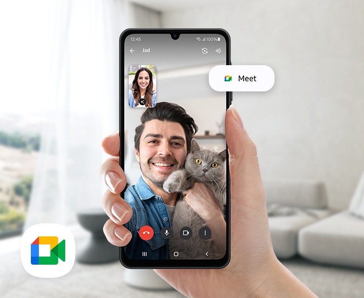 A hand holding the Galaxy A06 5G during a video call, with options for 'Meet' visible on the screen.