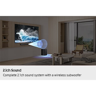 Living room setting with TV and B450F setup. Sound waves emanate from the soundbar and subwoofer.