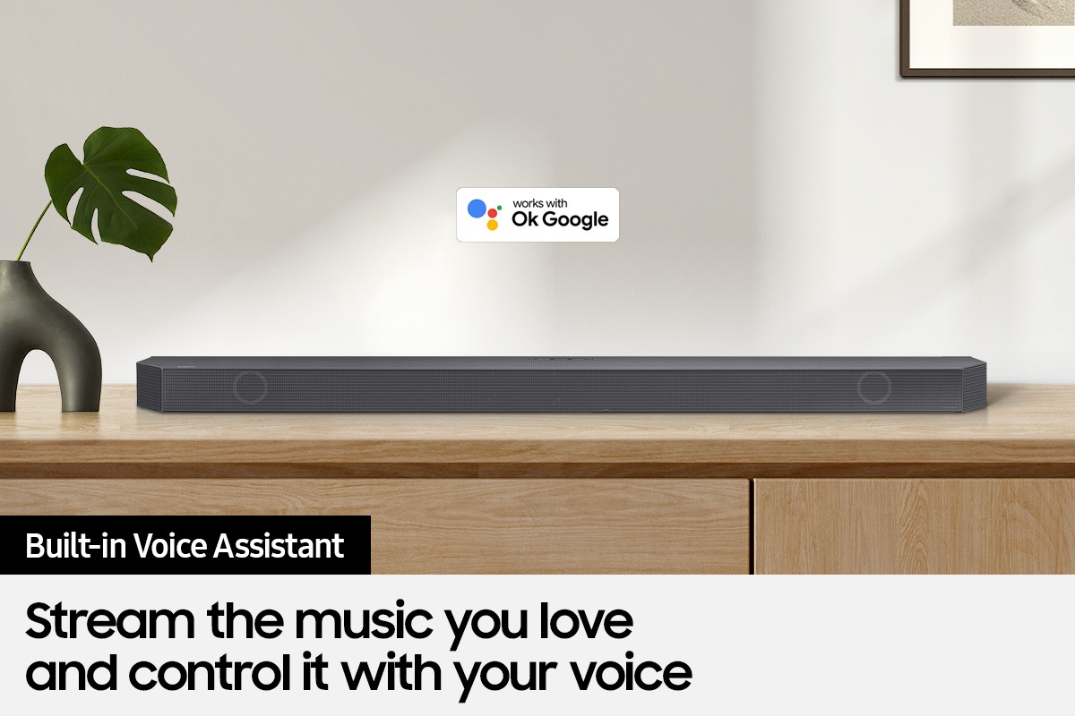 Ok Google logo can be seen along with Samsung Q800B soundbar which is sitting on living room cabinet.