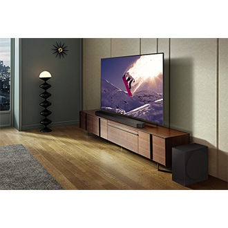 Samsung Soundbar Q800C, subwoofer and a TV in a living room.