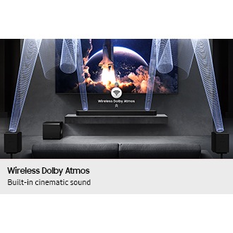 Wireless Dolby Atmos plays from Q990F below TV and rear speakers with sound waves and wireless icon with arrows pointing up.