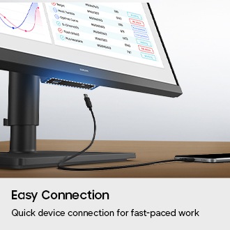 Easy Connection. Quick device connection for fast-paced work. A port at the bottom of the monitor is highlighted, and a phone charger is shown attempting to connect to it.