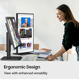 Ergonomic Design. View with enhanced versatility. A designer is using two monitors, one tilted and the other pivoted 90 degrees.