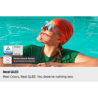 Scene of a woman in a pool spitting out water looks dull and washed out. TUV Rheinland Certified, Real Quantum Dot Display, www.tuv.com, ID 0217010367 logo. SGS Performance Tested No Cadmium (not detected) logo.