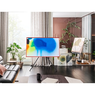 The Frame is on display on a Studio Stand in a living room. 