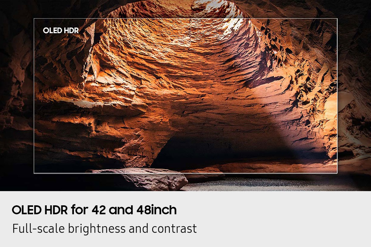 A scene of a water cave is enhanced by OLED HDR for improved picture clarity, so it seems the screen is part of real life.
