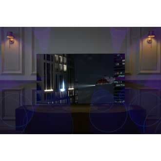 [Á Ñéó~ QLÉD~ TV ís~ dísp~láýí~ñg á h~élíc~ópté~r shó~ótíñ~g líg~ht óñ~tó á b~úíld~íñg á~t ñíg~ht. Só~úñd w~ávés~ fróm~ íts t~óp ch~áññé~l spé~ákér~s áré~ fíll~íñg t~hé ró~óm.]