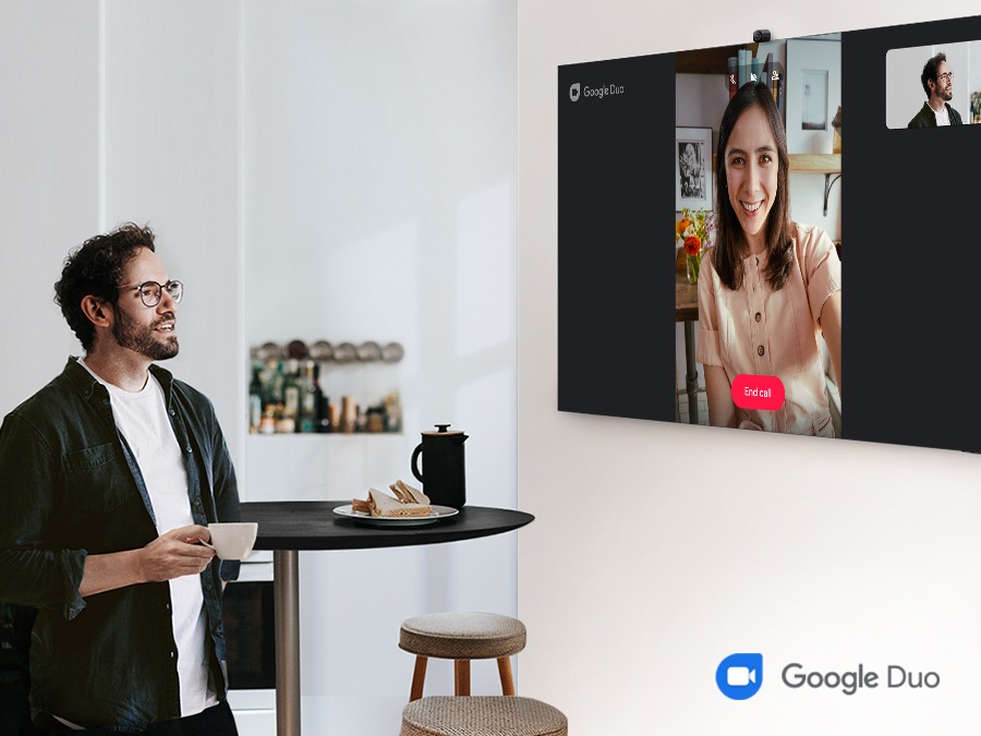 A man is having a video call with a woman via Google Duo.