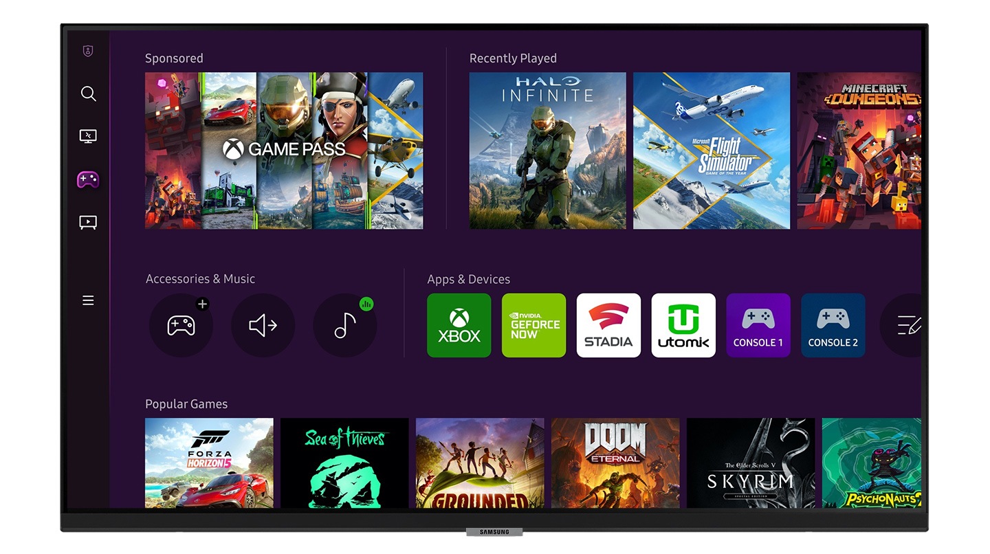 A monitor screen shows gaming hub starting screen with multiple games and apps available to download.